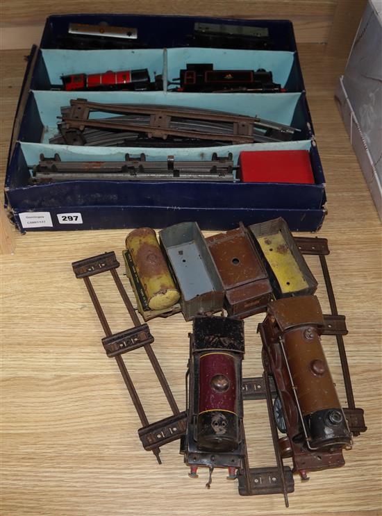 A quantity of mixed locos, track and carriages including Hornby